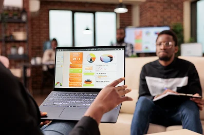 business team analyzing charts and diagrams