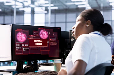 security engineer investigating breach alert